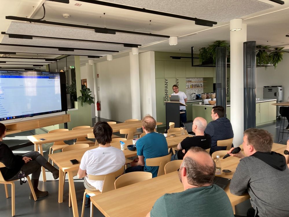 Christian's giving a presentation in the Klagenfurt office.