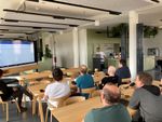 Christian's giving a presentation in the Klagenfurt office.