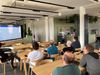 Christian's giving a presentation in the Klagenfurt office.