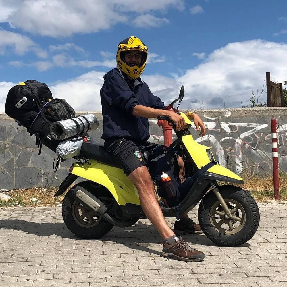 The journey through Italy on a 50cc scooter .