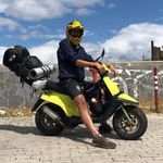 The journey through Italy on a 50cc scooter .