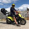 The journey through Italy on a 50cc scooter .