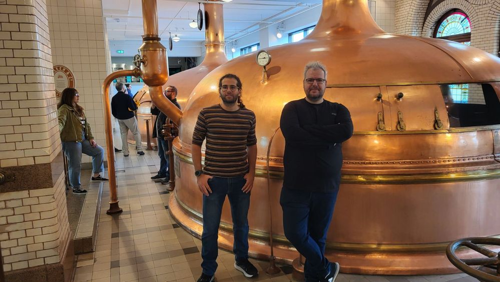 Heineken Brewery museum visit while participating in Innovation 2024. Here with George, the same George we fight over community badges but never for beer.
