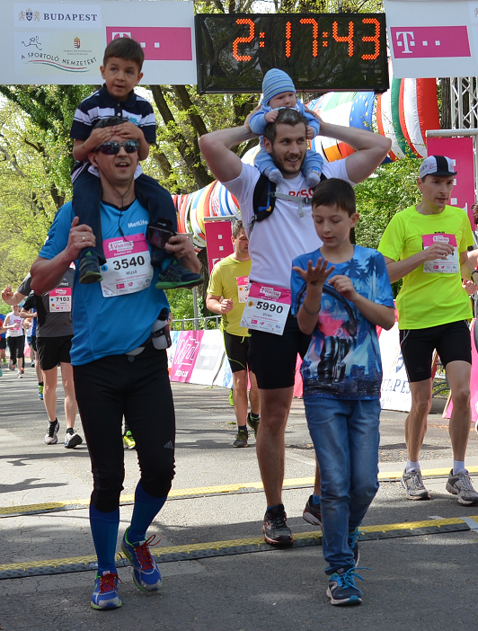 My most memorable half-marathon finish with my kids some years ago.